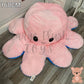 160cm pink and blue reversible octopus plush toy with happy face displayed on a wooden floor.