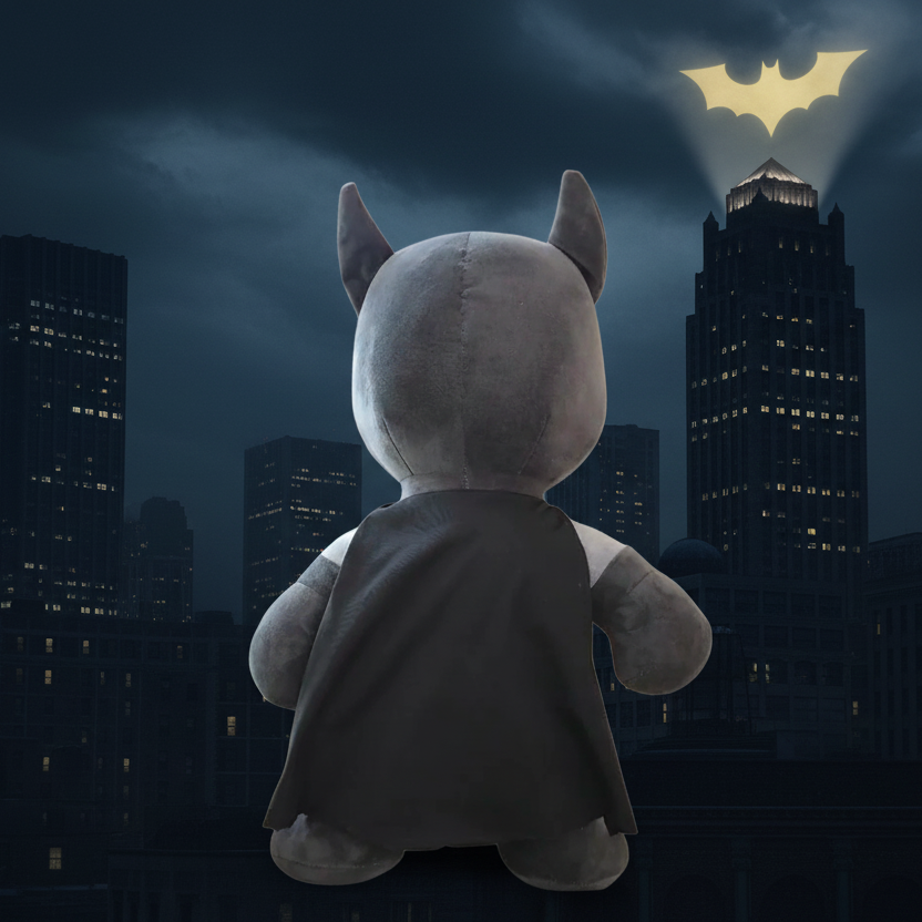 Batman Plush Toy 45cm back view showing superhero cape with Gotham City skyline background