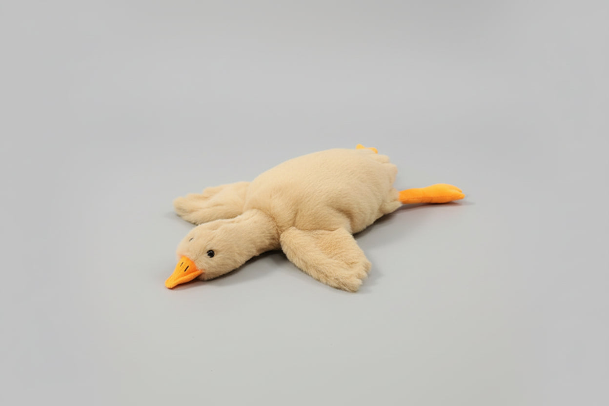 Beige giant goose plush toy pillow with soft stuffing and long body design for cuddling, sleeping and bedroom decor.