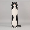 Black and white standing cat plush toy with raised paws, long body and cute cartoon expression.