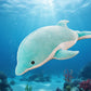 Blue dolphin plush toy swimming underwater above a coral reef with sunlight shining through the ocean.