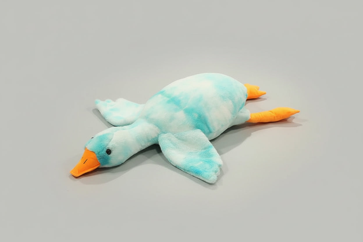 Blue tie dye giant goose plush toy pillow with soft stuffing and long body design for cuddling, sleeping and bedroom decor.