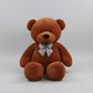 Large brown teddy bear plush toy with decorative bow tie soft stuffed animal gift for children and adults.
