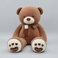 Brown teddy bear plush toy with love heart details, soft scarf and embroidered paw design.