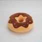 Chocolate donut plush pillow with colourful sprinkles and soft stuffed cushion design.