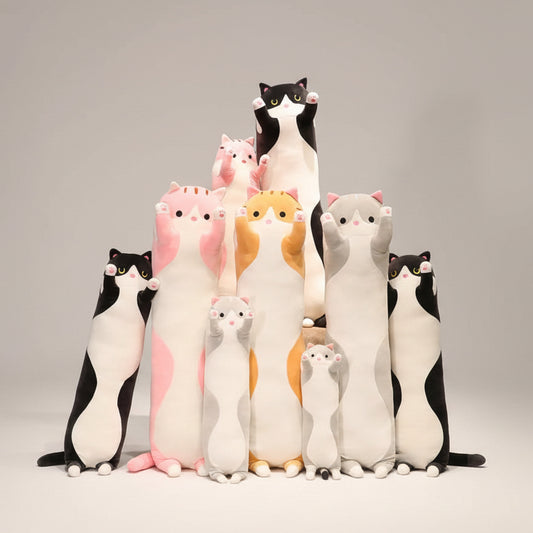 Collection of cute standing cat plush toys in assorted colours including black, white, pink, grey and orange displayed together.