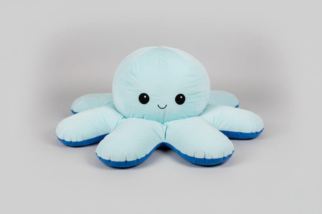 Happy octopus plush toy with soft cushion filling and cute smiling face for cuddling, sensory play and bedroom decor.