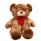 Large brown teddy bear plush toy with a red bow tie sitting on a white background
