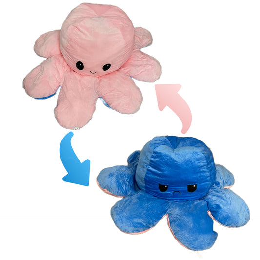 Pink and blue reversible octopus plush toy with happy and angry faces showing mood flip design on a white background.