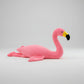 Pink flamingo plush toy with upright neck displayed on a white background
