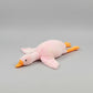 Pink giant goose plush toy pillow with soft stuffing and long body design for cuddling, sleeping and bedroom decor.