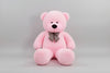 Large pink teddy bear plush toy with decorative bow tie soft stuffed animal gift for children and adults.