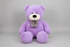 Large purple teddy bear plush toy with decorative bow tie soft stuffed animal gift for children and adults.