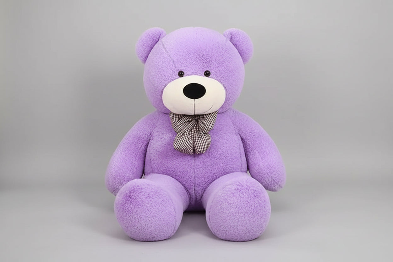 Large purple teddy bear plush toy with decorative bow tie soft stuffed animal gift for children and adults.