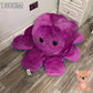 130cm reversible purple octopus plush toy with angry expression, oversized soft stuffed cushion displayed on a wooden floor.