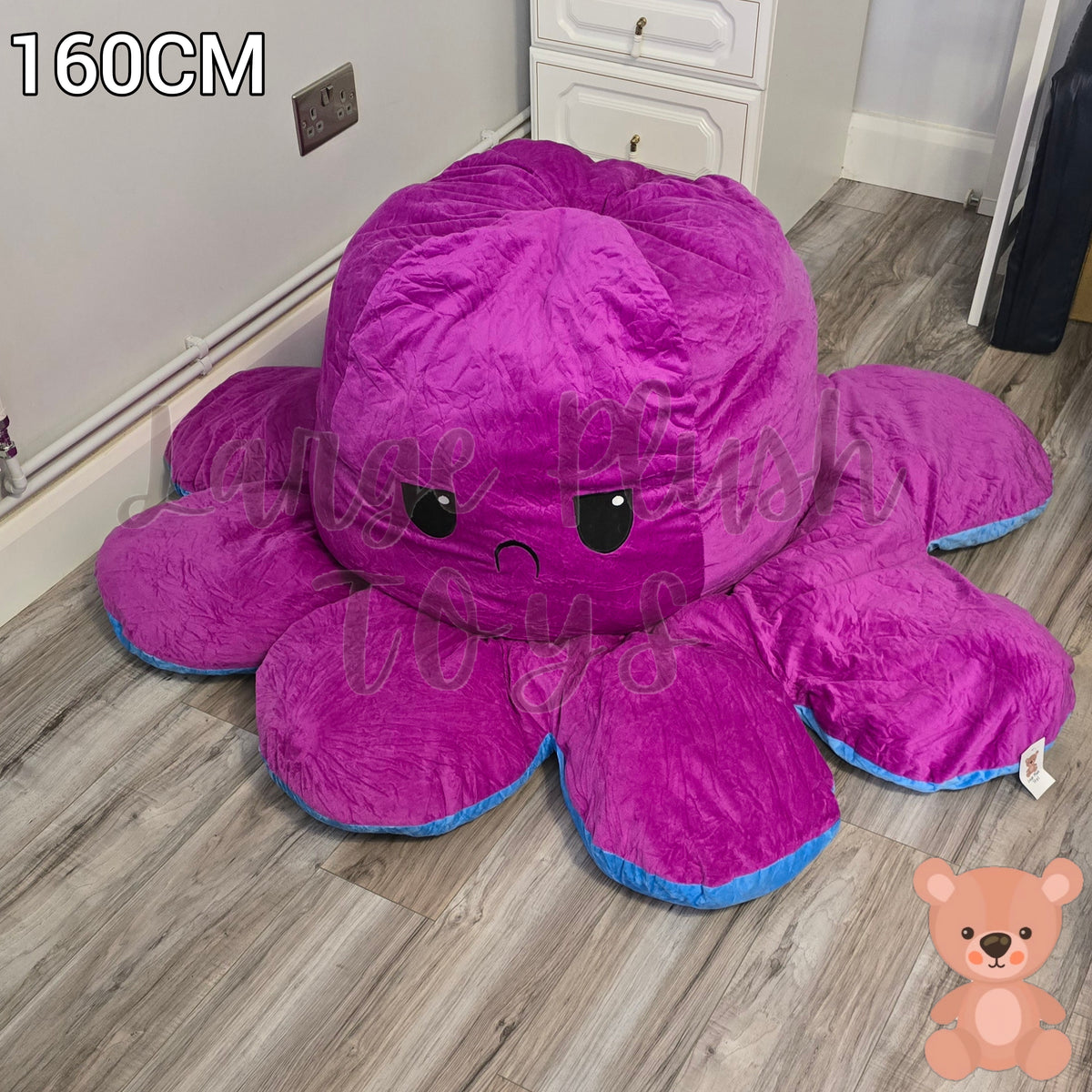 160cm reversible purple octopus plush toy with angry expression, giant soft stuffed cushion displayed on a wooden floor.