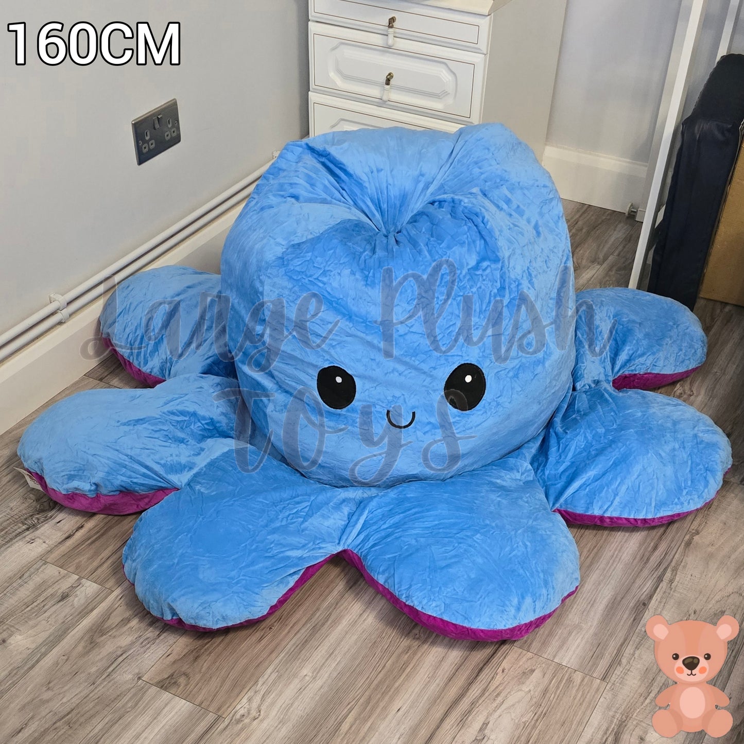 160cm reversible blue and purple octopus plush toy with happy expression, giant soft stuffed cushion displayed on a wooden floor.