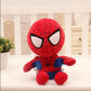 Superman plush toy displayed with superhero city skyline background