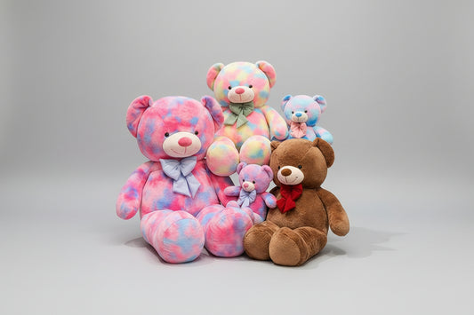 Colourful teddy bear plush toy collection featuring multiple soft stuffed bears in different sizes