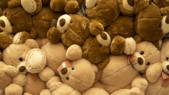 Large plush toys and teddy bears displayed together 