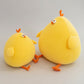 Pair of yellow chicken plush toys with soft stuffed bodies, orange feet and cute cartoon faces.