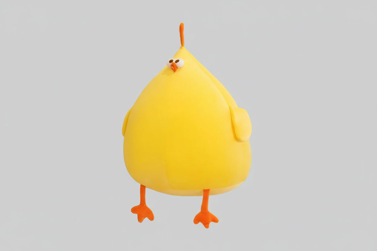 Yellow chicken plush toy with soft stuffed body, orange feet and cute cartoon face.