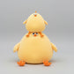 Stacked yellow chicken plush toy family set featuring large and small soft stuffed chickens with orange feet.