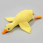 Yellow giant goose plush toy pillow with soft stuffing and long body design for cuddling, sleeping and bedroom decor.